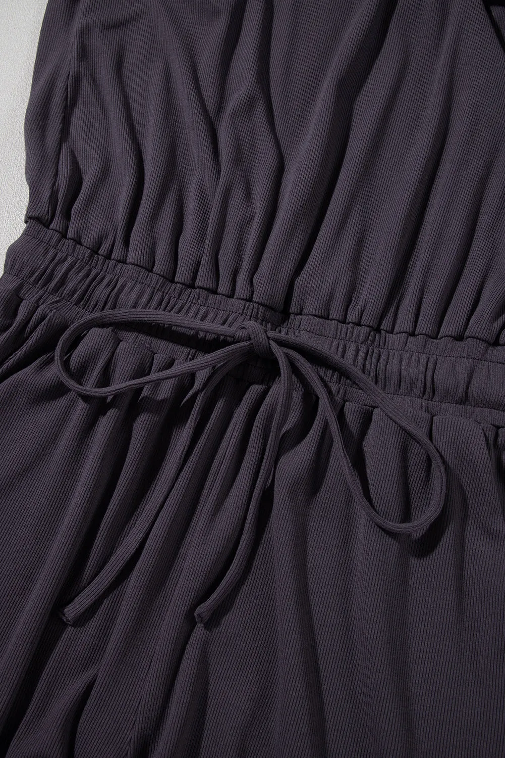 Bristol Black Knit Open Back Cap Sleeve Drawstring Romper